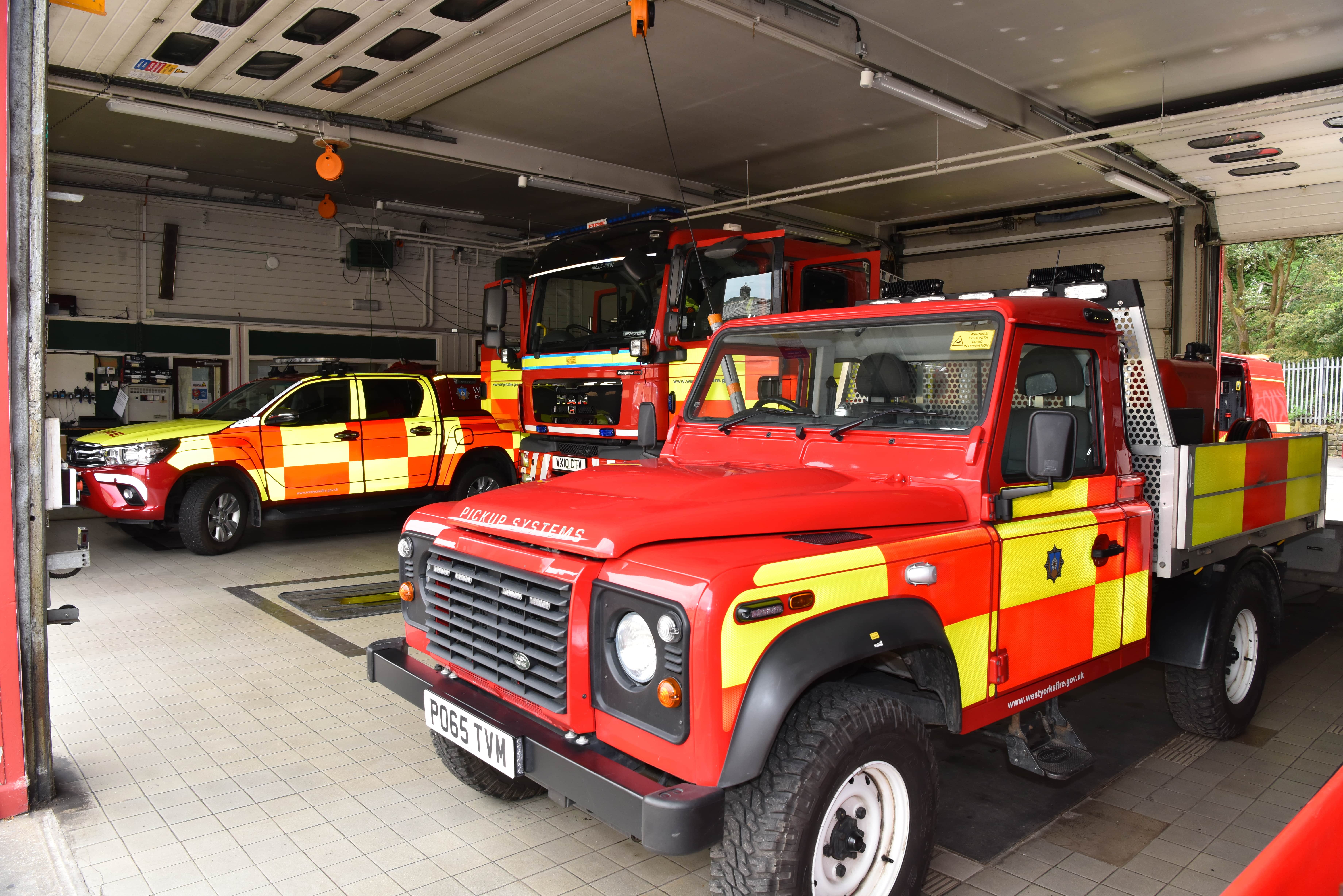 Fire service Land Rover in fire station. 