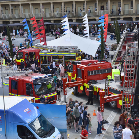 Emergency Services Day at The Piece Hall at Halifax, Crowds gathering round multiple WYFRS vehicles