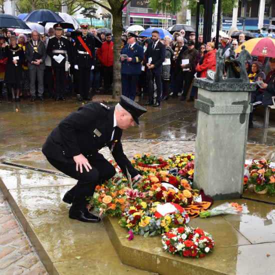 Station Commander Dave Cookson laying wreath at Bradford City Hall 