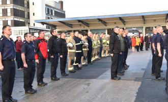 Photo of staff at WYFRS HQ undertaking a minute's silence at Remembrance Day 2021.