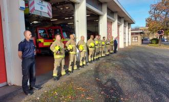 Photo of crews at Huddersfield undertaking a minute's silence at Remembrance Day 2021.