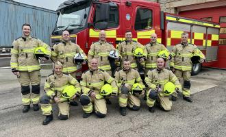 Damian Cameron, back row third from left, with his fire crew