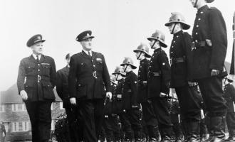 Leeds city FB inspection at Gipton fire station ,by Her majesty inspector Mr PP Booth with CFO French. Date 1956
