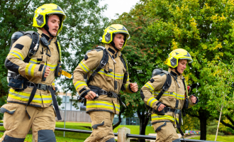 FF Moody, CM Neal and FF Gray running in full PPE