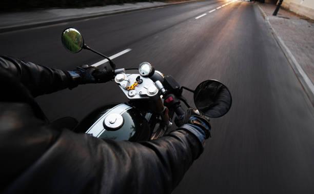 Point of view of driver on a motorcycle on the road driving.