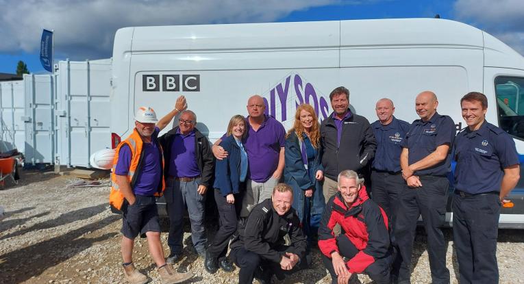 Crew in front of BBC van