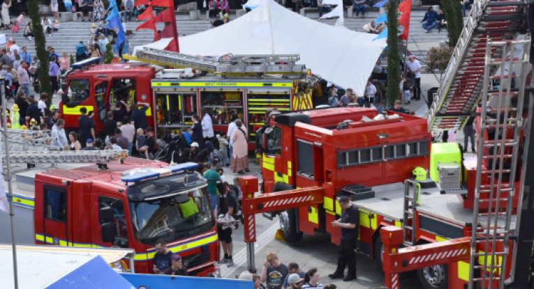 Emergency Services Day at The Piece Hall at Halifax, Crowds gathering round multiple WYFRS vehicles