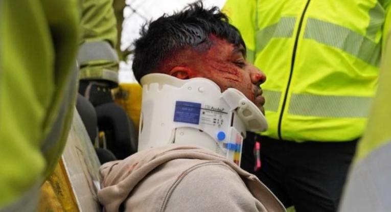 Man in neckbrace
